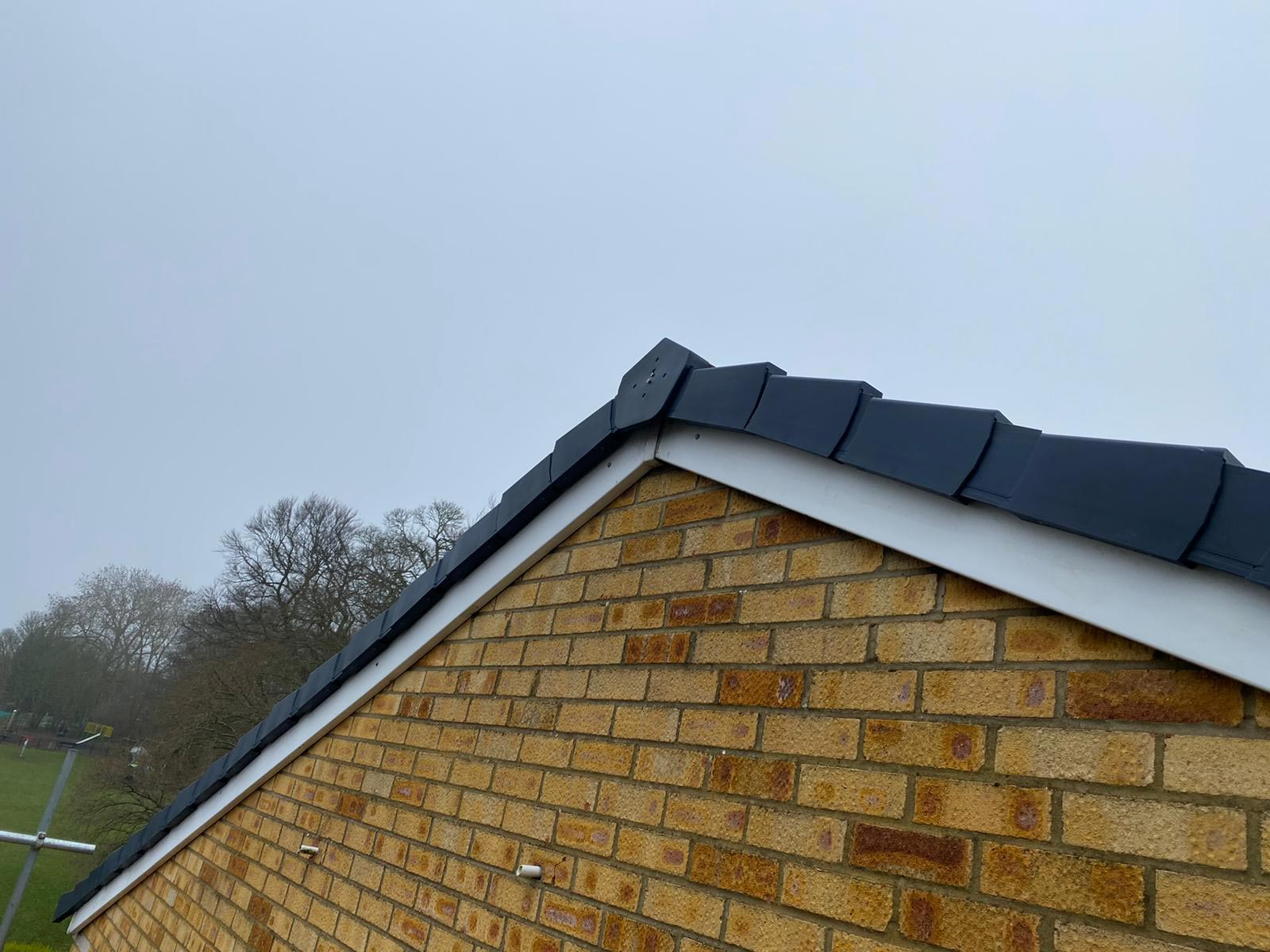 New ridge tile work close-up